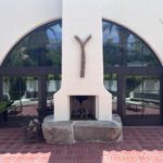 Custom Arched Mulled Pivot Door Unit (Exterior View)